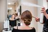 Hairstyling process using hairspray in a beauty salon